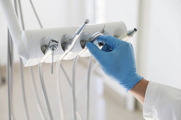 Professional Tooth Extraction technician working in Winthrop, IA